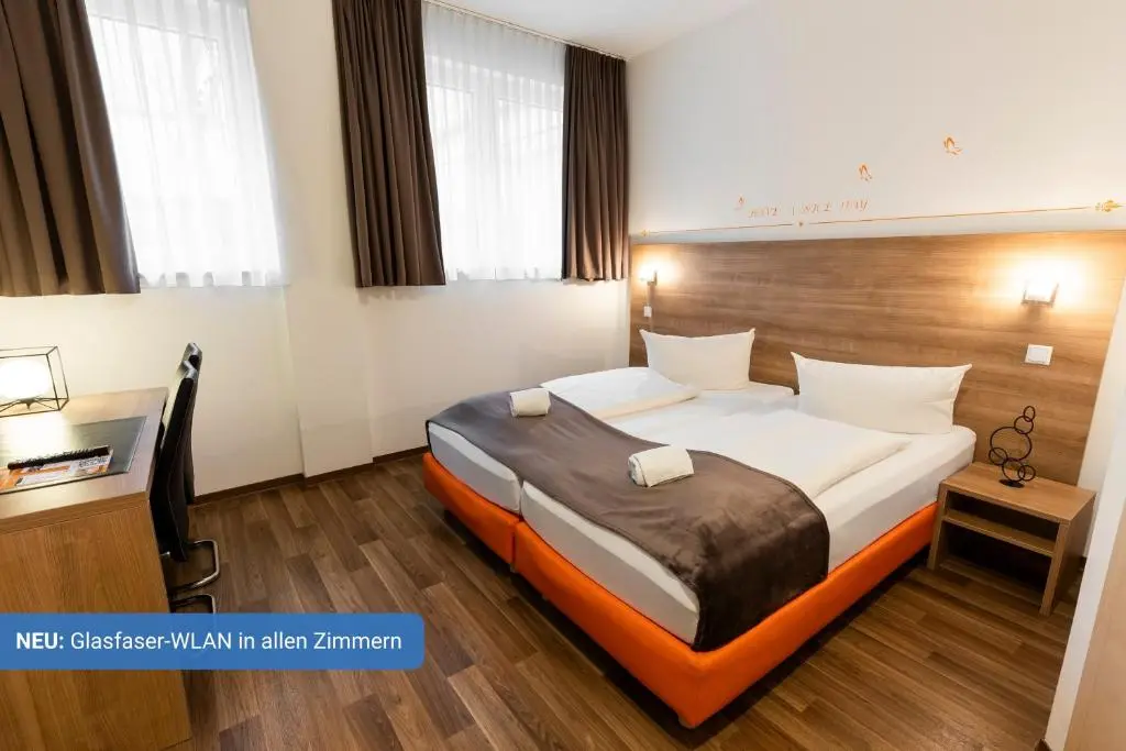Orange Hotel und Apartments